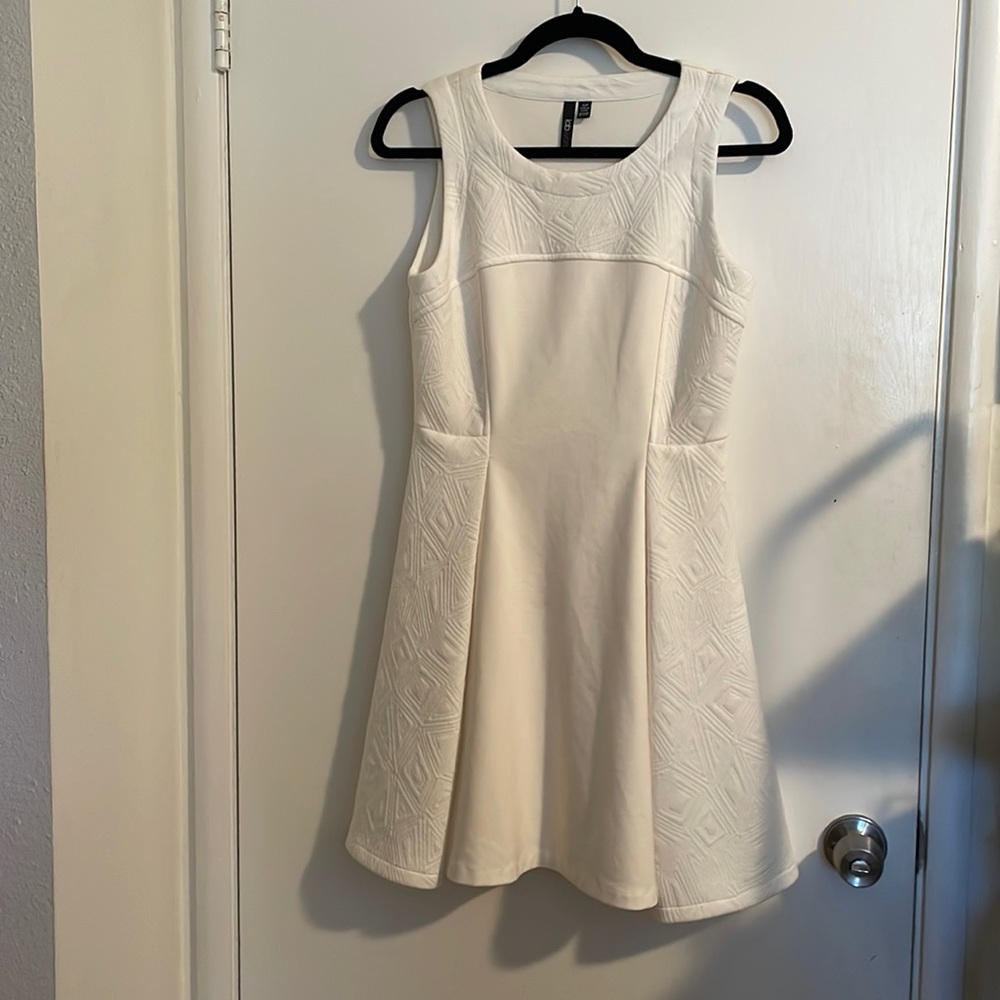 Gorgeous knee length white sleeveless dress
